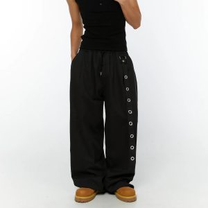 Pantalon œillets